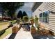 Stone patio with seating area and potted plants at 3554 Umatilla Sw Ln, South Fulton, GA 30331