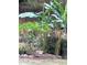 Tropical garden with banana trees and angel's trumpets at 3554 Umatilla Sw Ln, South Fulton, GA 30331