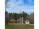 A-frame home with detached garage and pavilion at 415 Bruce Rd, Douglasville, GA 30134