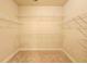 Large walk-in closet with wire shelving at 4421 Samford Park Ave, Sugar Hill, GA 30518