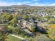 An aerial view of a brick building in a lush neighborhood with mature trees at 351 Washington Ne Ave # 302, Marietta, GA 30060