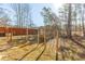 Vineyard with wooden posts and a small yellow wagon at 3829 Reece Farms Ct, Powder Springs, GA 30127