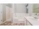 Bathroom with soaking tub, stand up shower and vanity at 254 Cobblestone Ln, Mcdonough, GA 30252