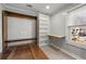 A small bedroom with built-in shelving and a Murphy bed that's folded down at 1196 Oleander Nw St, Atlanta, GA 30314