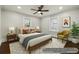 Staged bedroom featuring a comfortable bed, stylish decor, and a cozy atmosphere at 1196 Oleander Nw St, Atlanta, GA 30314