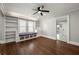 Cozy bedroom featuring built-in shelving, a window seat, and hardwood floors at 1196 Oleander Nw St, Atlanta, GA 30314