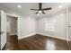 Spacious bedroom with hardwood floors, a ceiling fan and recessed lighting at 1196 Oleander Nw St, Atlanta, GA 30314
