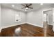 Classic bedroom with hardwood floors, ceiling fan, and lots of natural light at 1196 Oleander Nw St, Atlanta, GA 30314