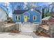 Charming blue house with white picket fence and stone accents at 1196 Oleander Nw St, Atlanta, GA 30314