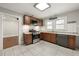 Updated kitchen boasts stainless steel appliances, stone countertops, and ample cabinet space at 1196 Oleander Nw St, Atlanta, GA 30314