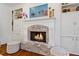 Stone fireplace with white mantel and built-ins at 6220 Vickery Creek Rd, Cumming, GA 30040