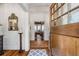 Bright entryway with herringbone floors and view to sunroom at 6715 Berkley Rd, Cumming, GA 30040