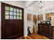 Elegant entryway with wood floors and built-in shelving at 6715 Berkley Rd, Cumming, GA 30040