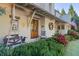 Charming front porch features a swing and rocking chair at 6715 Berkley Rd, Cumming, GA 30040