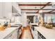 Modern kitchen with a farmhouse sink and stainless steel appliances at 6715 Berkley Rd, Cumming, GA 30040