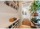 Mudroom with built-in storage, shoe cubbies and decorative shelving at 6715 Berkley Rd, Cumming, GA 30040