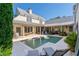 Inviting rectangular pool, surrounded by a patio and lush greenery at 6715 Berkley Rd, Cumming, GA 30040