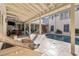 Enjoy the refreshing pool and relax in the hammock under the covered patio at 6715 Berkley Rd, Cumming, GA 30040