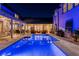 Luminous nighttime view of a private pool, perfect for evening relaxation at 6715 Berkley Rd, Cumming, GA 30040