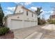 Four-car garage with ample space and concrete driveway at 6830 Vickery Creek Rd, Cumming, GA 30040