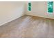 Bright bedroom with carpet flooring and natural light coming from two windows at 2007 Variations Ne Dr, Atlanta, GA 30329