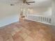 Spacious living room with beautiful tile flooring and a modern ceiling fan at 2007 Variations Ne Dr, Atlanta, GA 30329