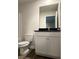 Bright bathroom featuring a granite countertop vanity with white cabinets at 107 Meadowview Dr # 23, Temple, GA 30179