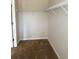 Walk-in closet with wire shelving, ready to be organized and filled with your personal belongings at 107 Meadowview Dr # 23, Temple, GA 30179