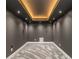 Finished basement with decorative ceiling and carpet at 1723 Capistrana Pl, Decatur, GA 30032