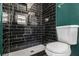 Bathroom featuring sleek black tiles in the shower area at 1723 Capistrana Pl, Decatur, GA 30032
