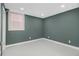 This bedroom features neutral walls and trim, providing a serene and inviting space at 1723 Capistrana Pl, Decatur, GA 30032