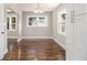 Bright dining room featuring hardwood floors, and natural light at 1723 Capistrana Pl, Decatur, GA 30032
