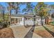 Cozy home featuring a covered carport and a charming front porch, blending comfort with curb appeal at 1723 Capistrana Pl, Decatur, GA 30032