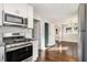 Modern kitchen showcasing stainless steel appliances, white subway tile, and stylish fixtures at 1723 Capistrana Pl, Decatur, GA 30032