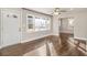 Bright living room featuring gleaming hardwood floors, and a ceiling fan at 1723 Capistrana Pl, Decatur, GA 30032