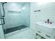 Modern bathroom with a large walk-in shower and floating vanity at 1330 Lockwood Sw Dr, Atlanta, GA 30311