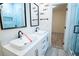 Clean bathroom with double vanity and modern fixtures at 1330 Lockwood Sw Dr, Atlanta, GA 30311