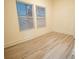Cozy bedroom with neutral walls and two windows at 1330 Lockwood Sw Dr, Atlanta, GA 30311