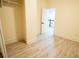 Simple bedroom with light walls and wood-look floors at 1330 Lockwood Sw Dr, Atlanta, GA 30311