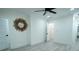 Bright bedroom with wood-look floors and mirrored accent wall at 1330 Lockwood Sw Dr, Atlanta, GA 30311