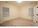 Bright bedroom featuring light walls and wood-look flooring at 1330 Lockwood Sw Dr, Atlanta, GA 30311