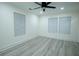Spacious bedroom featuring wood-look floors and ceiling fan at 1330 Lockwood Sw Dr, Atlanta, GA 30311