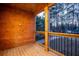 Deck overlooking wooded backyard with neighborhood view at 1330 Lockwood Sw Dr, Atlanta, GA 30311