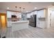Modern kitchen with white cabinets, stainless steel appliances, and an island at 1330 Lockwood Sw Dr, Atlanta, GA 30311