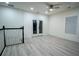 Bright upper landing with balcony access and ceiling fan at 1330 Lockwood Sw Dr, Atlanta, GA 30311