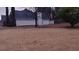 Spacious backyard with sparse grass and some trees at 2562 Pendergrass Ct, Ellenwood, GA 30294