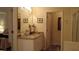 Bathroom with granite countertop and a mirror at 2562 Pendergrass Ct, Ellenwood, GA 30294