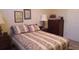Charming bedroom with stylish decor, a comfortable bed, and ample natural light at 2562 Pendergrass Ct, Ellenwood, GA 30294
