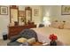Comfortable primary bedroom featuring chair, dresser, and queen size bed at 2562 Pendergrass Ct, Ellenwood, GA 30294