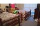 Bedroom showing two beds and stored boxes; ideal for maximizing space and organization at 2562 Pendergrass Ct, Ellenwood, GA 30294